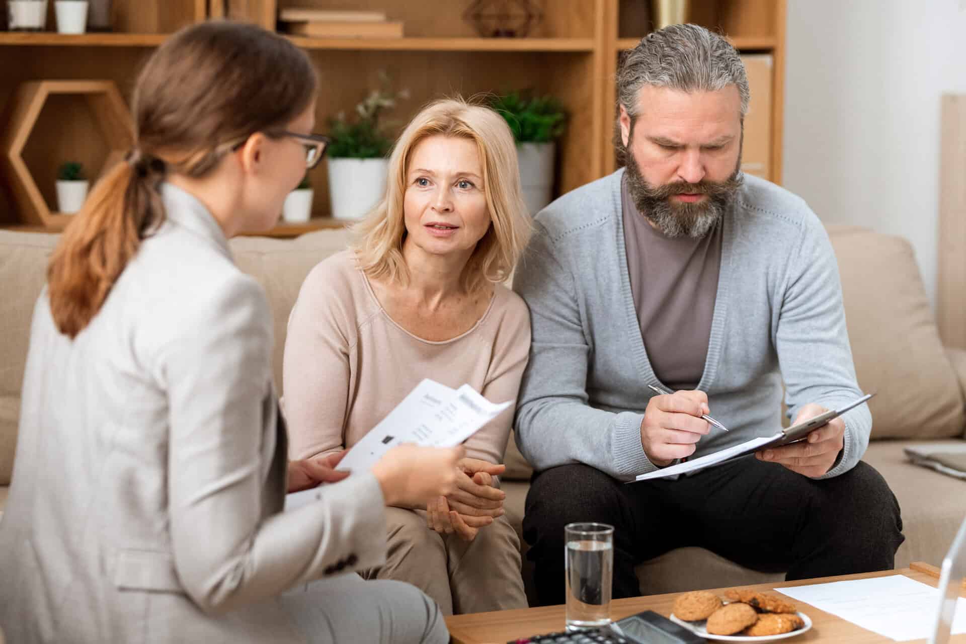 A couple in a therapy session, highlighting the importance of divorce counseling